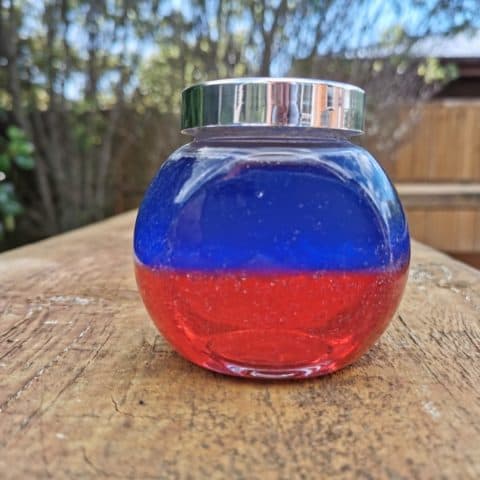 Sensory Bottle with Baby Oil Blue & Red Colors